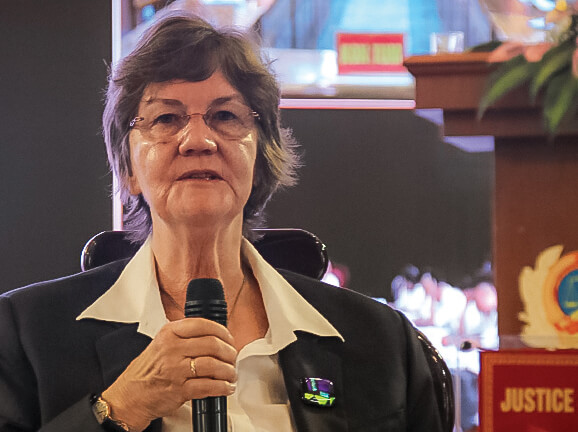 Photo of Justice Stevenson speaking to workshop delegates in Vietnam.