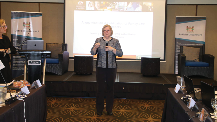 Photo of Glenda Frew leading a workshop on anonymisation of family law judgments